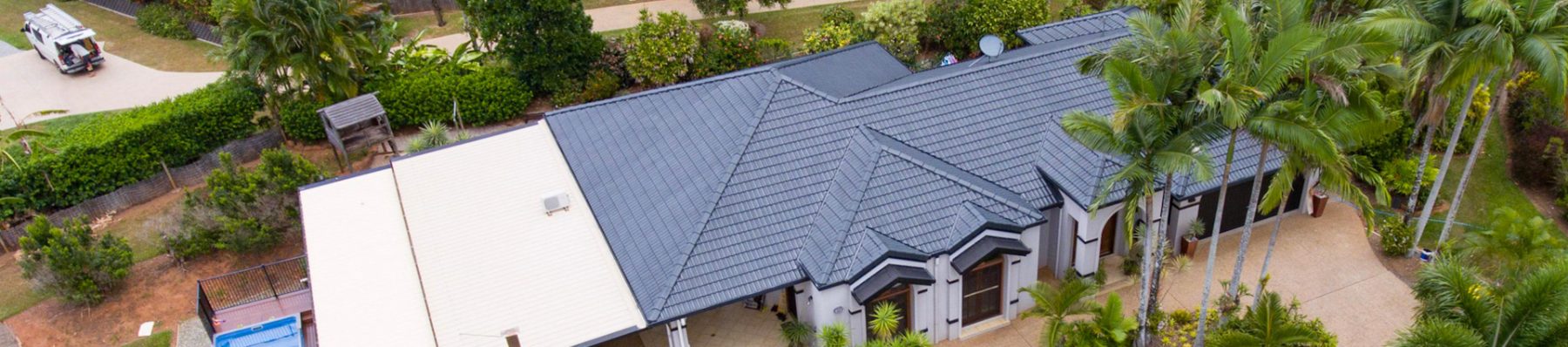 Freshly painted charcoal tile roof in Cairns