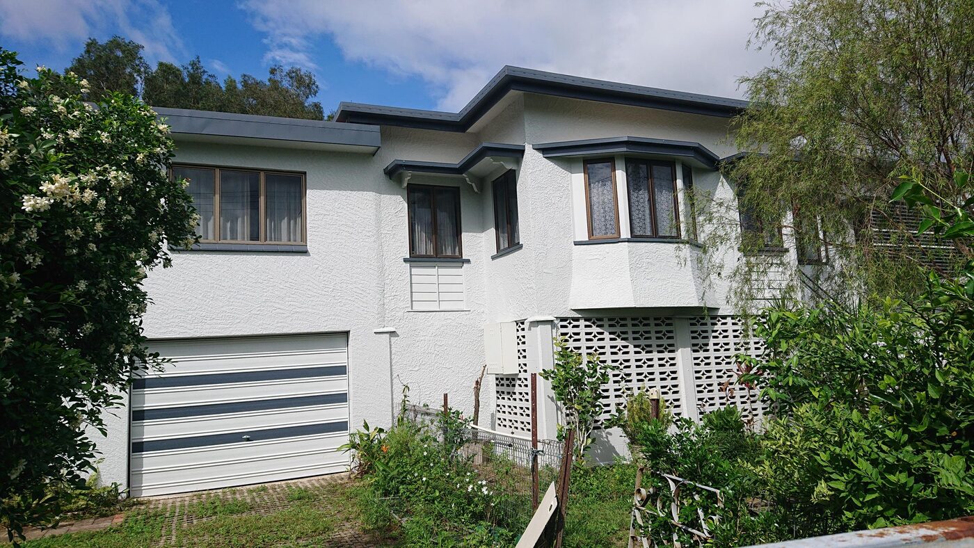 Two storey home with freshly coated roof